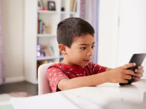 What is an appropriate age for a child to get a cell phone, and is it different for girls and boys?